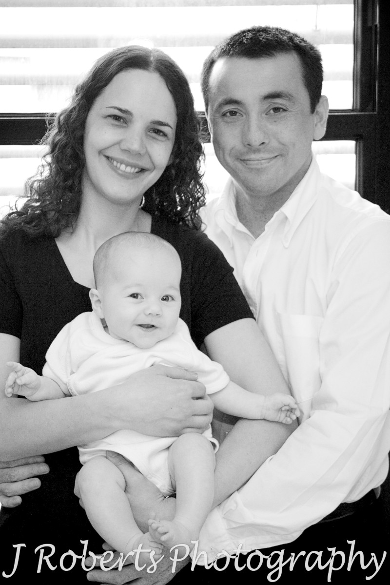Parents with smiling baby - baby portrait photography sydney